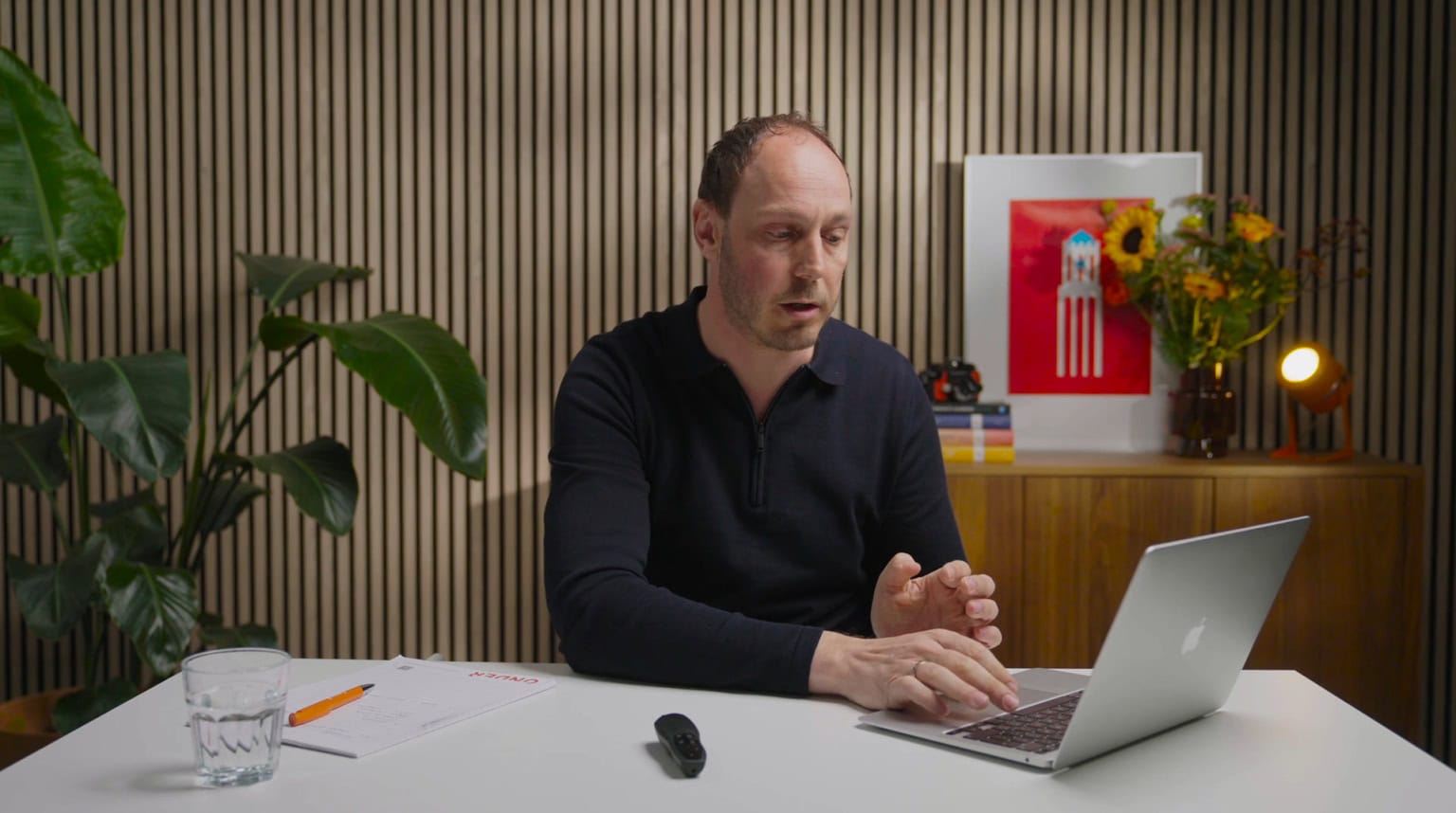 Ivo behind laptop busy explaining